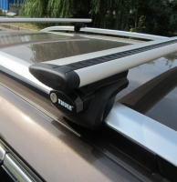 Багажник на крышу Thule Wing bar с аэродинамическими поперечинами для DAEWOO Tacuma 5d универсал (00-08) на  рейлинги